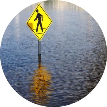 Flooding Road with Traffic Sign