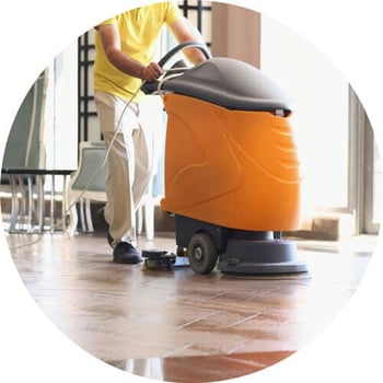 Orange Floor Scrubber Cleaning Floor