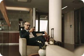 Man Relaxing in Aiport Lounge