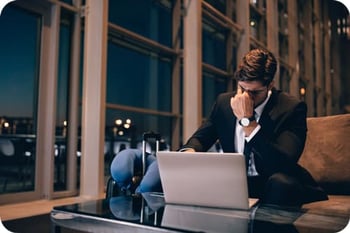 Stressed Business Man in Lounge
